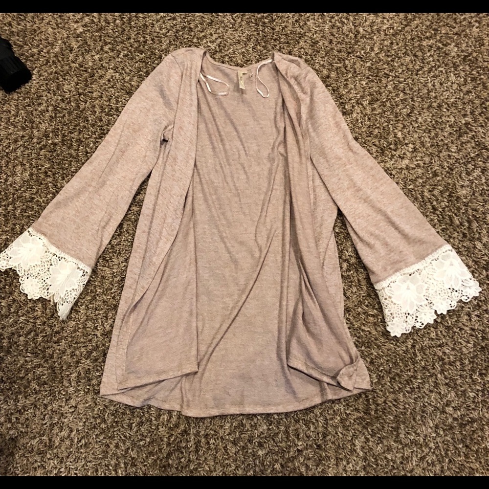 Mid length cream cardigan with crochet detail